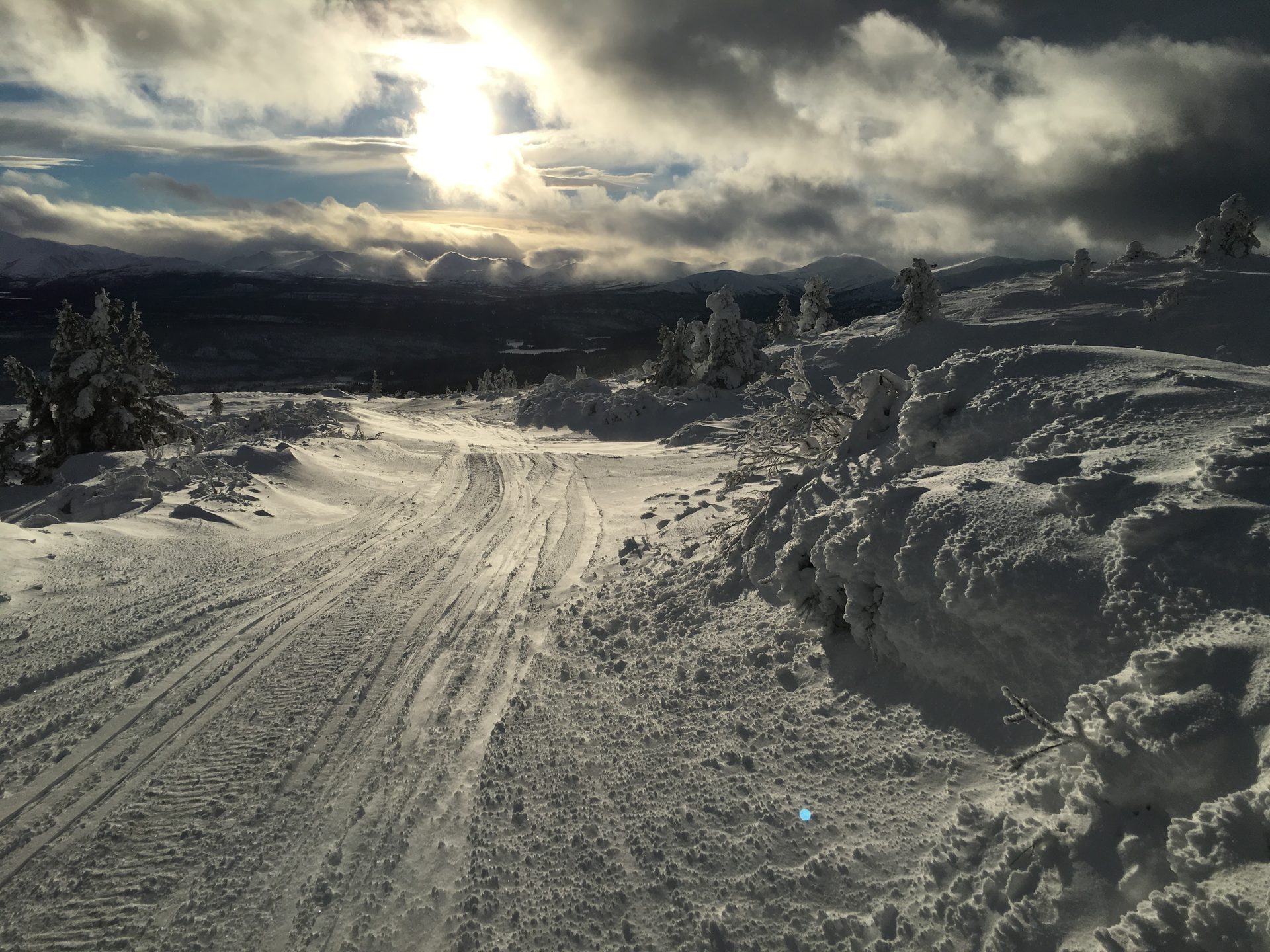 Snow-covered access road to a remote communications site